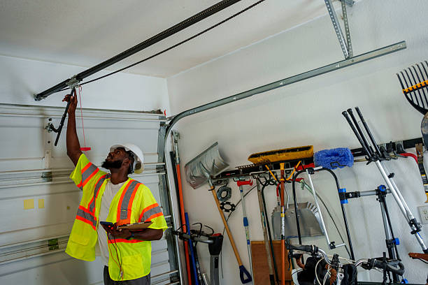 Professional Garage Door Roller Replacement technician working in Caledonia, MI